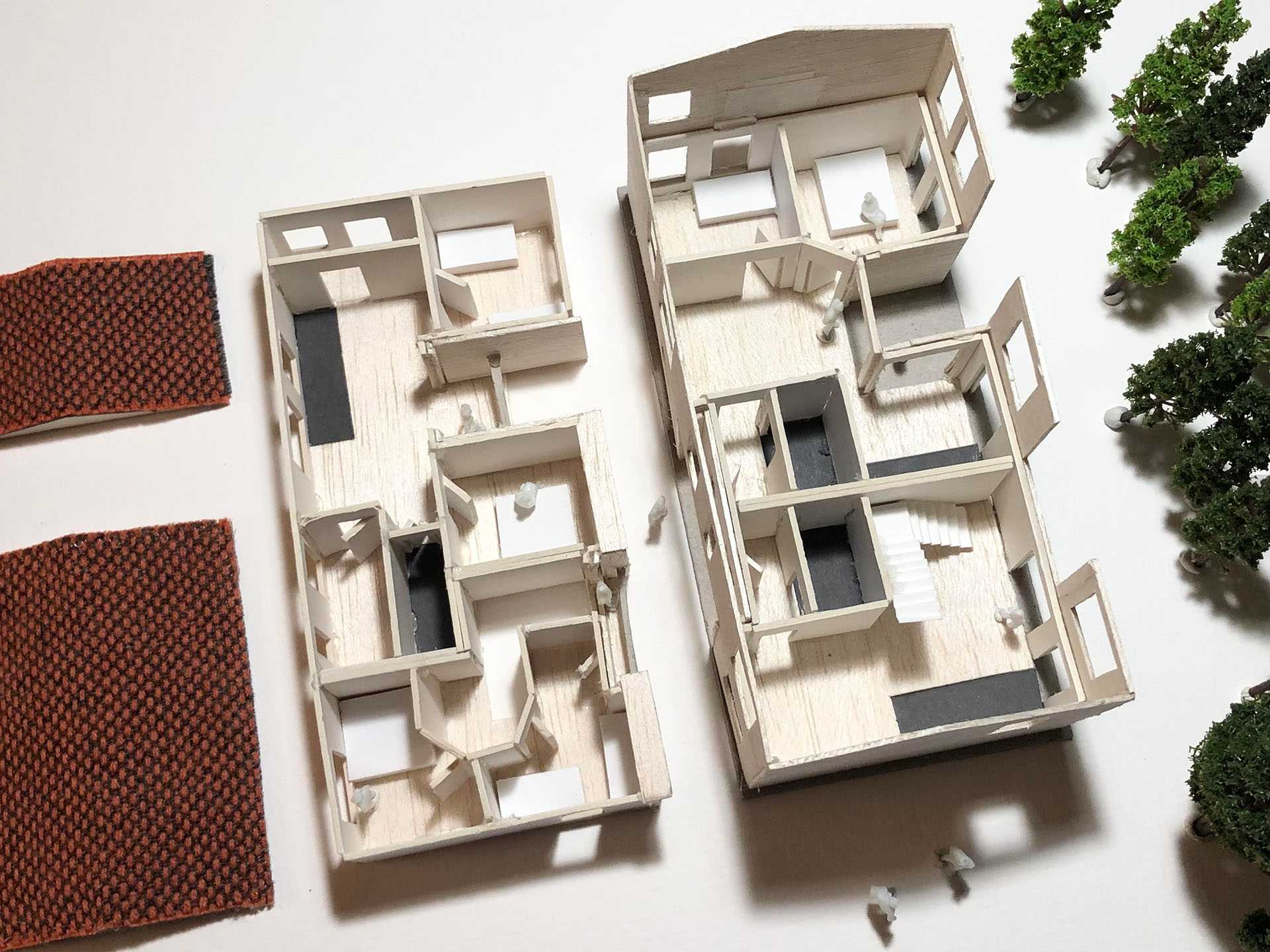 A home unit designed to house three families on a site in North Weald. Scale 1:100.