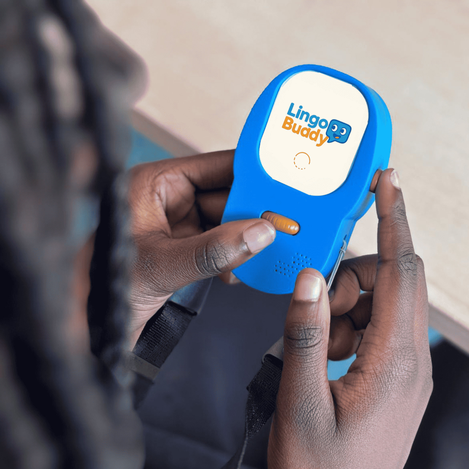 Lingo Buddy is a language-learning walkie-talkie designed to support children aged 6-11 years old who are learning English as an additional language (EAL). It combines the familiarity of a walkie-talkie with interactive language games, helping children build vocabulary and confidence through play. The device features a playful, ergonomic design with a scroll wheel for tactile interaction, encouraging hands-on learning.