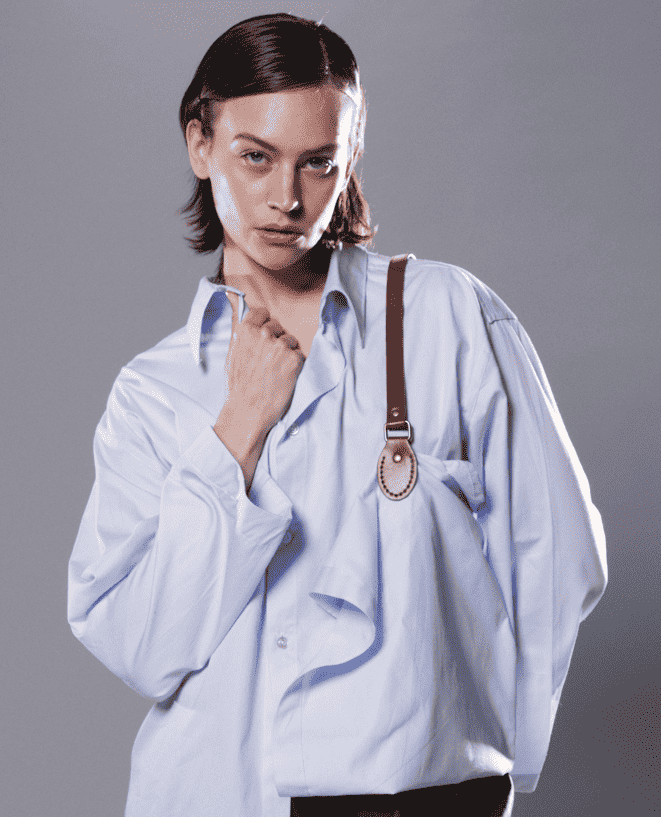 This collection evokes the connection between women and bags and the idea that women are born wearing bags as they are such an integral part of everyday outfits. To explore this, Paget looked at classic garments where she added the trompe l'oil of a bag being worn.
