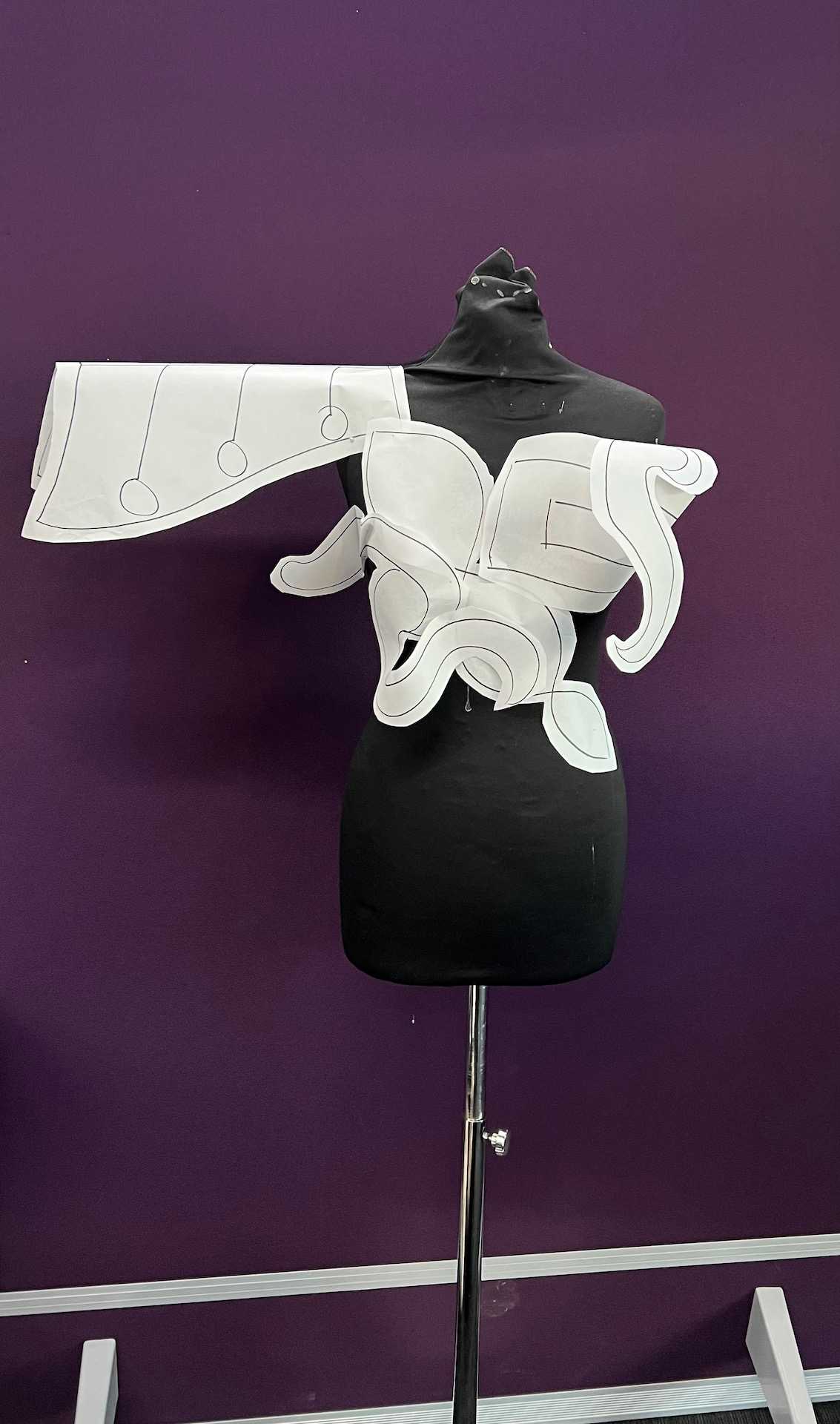 Draping with shapes from a concept board for the “Progressive Details Project”. This was the beginning of developing a final garment for women's basketball.