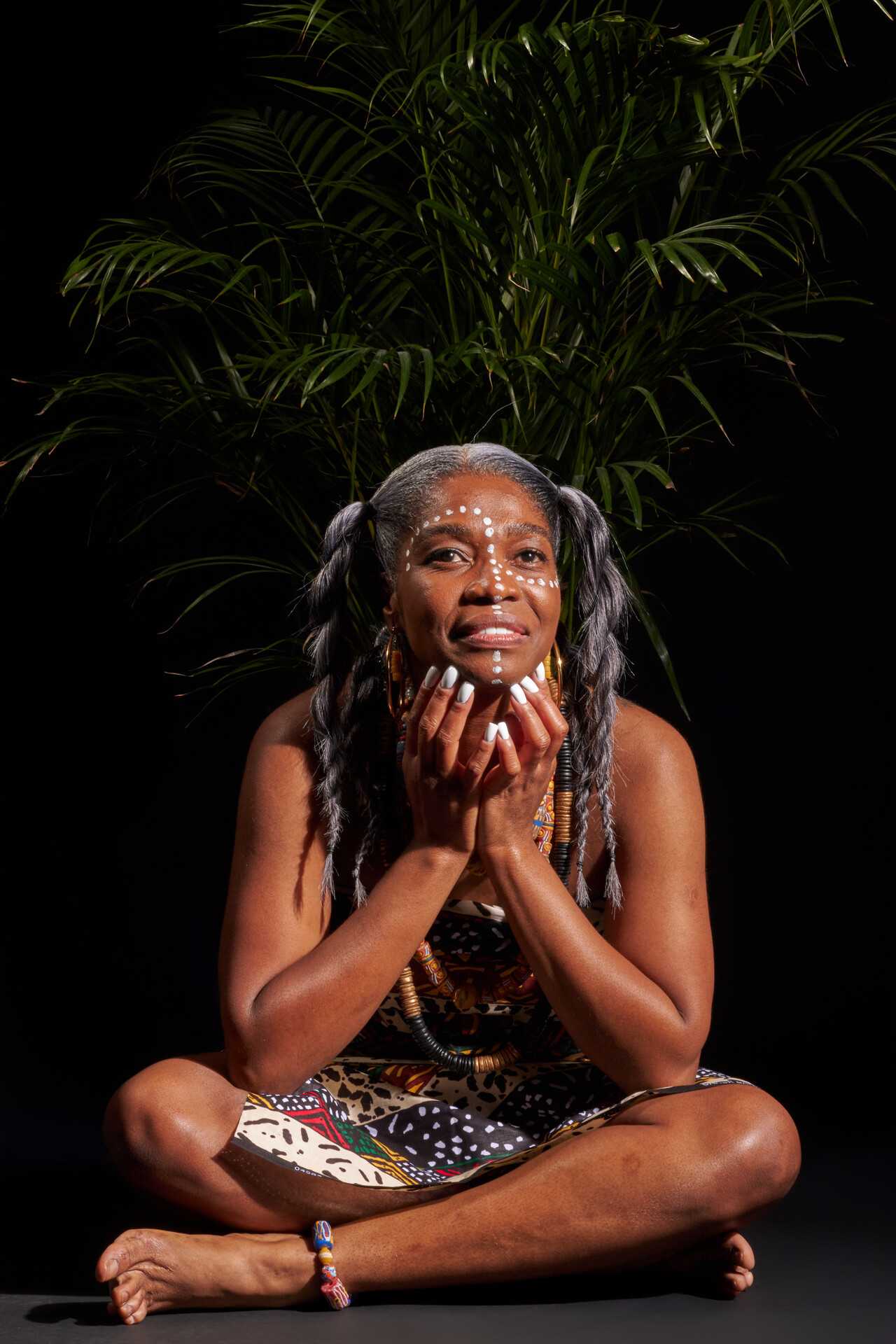 A portrait of Oyeleke's mother, adorned in traditional attire as a princess. Oyeleke tried capturing her essence in pure simplicity, with nothing to distract her presence.