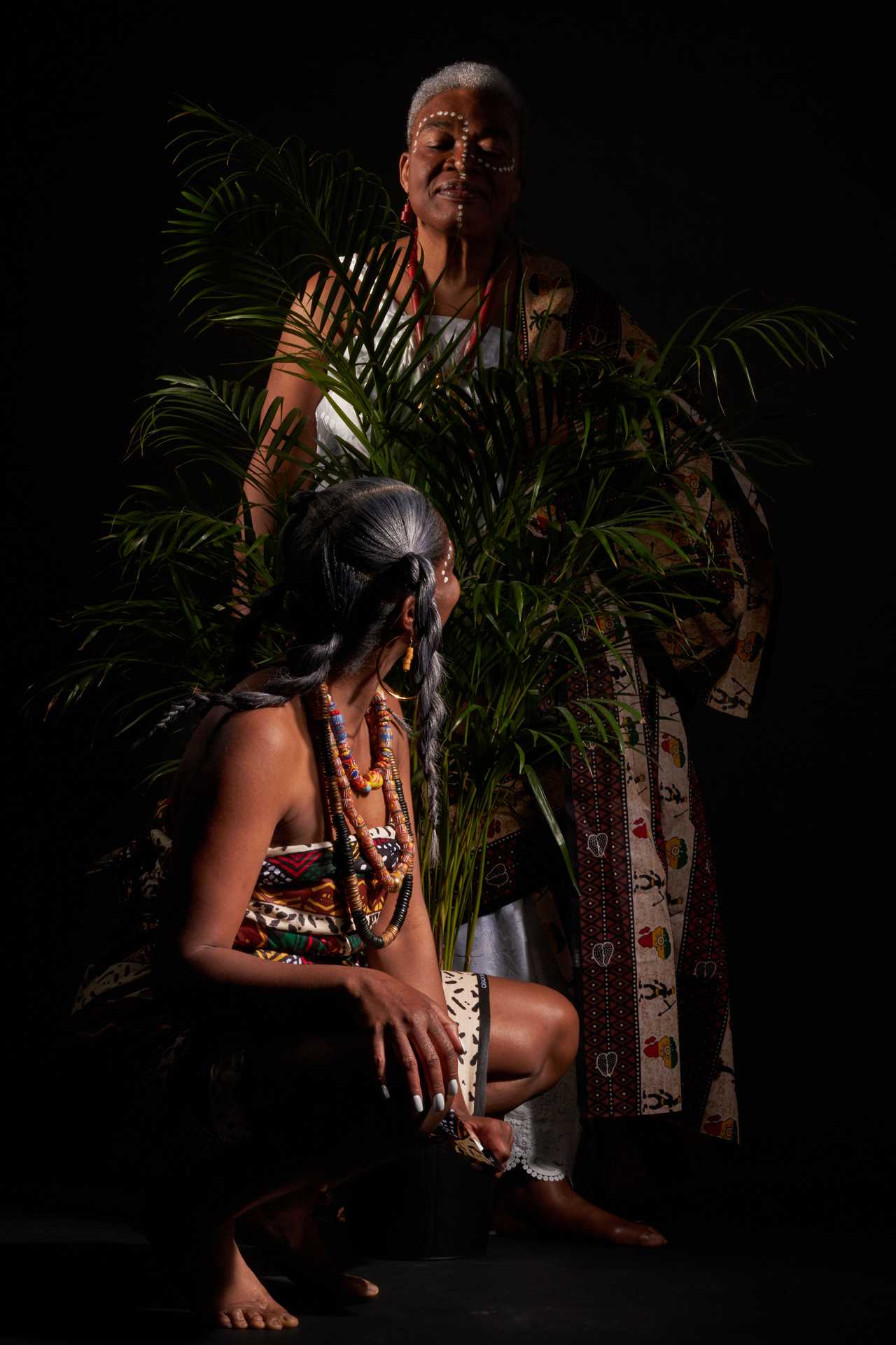 A playful capture of a grandmother, the family matriarch, and Oyeleke's mother. Oyeleke's grandmother, always watchful, sees and knows everything, a reminder of her wisdom and strength in our lives.